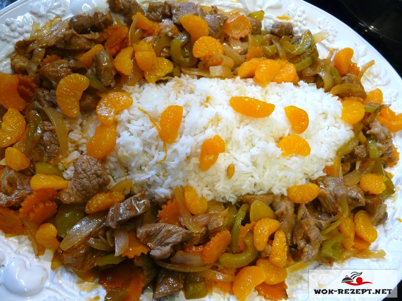 Rezept Schweinefleisch süßsauer mit Mandarine,Gurke,Jasmin-Reis